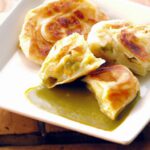 Roti Canai & Curry Dip: A Flaky Delight with Spicy Twist