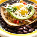 Morning Boost: Breakfast Tostadas with Beans & Eggs Delight
