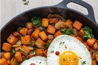 Sunrise Delight: Sweet Potato Hash with Perfect Fried Eggs