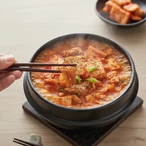 Savor Kimchi Jjigae with Tuna: Korea’s Spicy Stew Delight