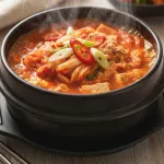 Savor Kimchi Jjigae with Tuna: Korea’s Spicy Stew Delight