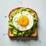 Elevate Breakfast: Simple Avocado Toast Topped with Egg