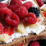 Sweet Meets Creamy: Ricotta & Berry Toast Drizzled with Honey